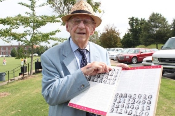 FAMOUS ALUMNUS -- Mr. Luther Masingill, Central High Class of 1941, a member of the National Radio Hall of Fame, points to his senior portrait in the 1941 Central Champion yearbook. Masingill passed away at the age of 92 Oct. 20.