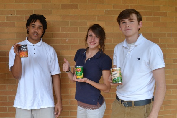 HUNGER BOWL 2012 -- Students before they donated their cans Mike Jones(left), Brittany Stiles(middle), Johnathan Morris(right).