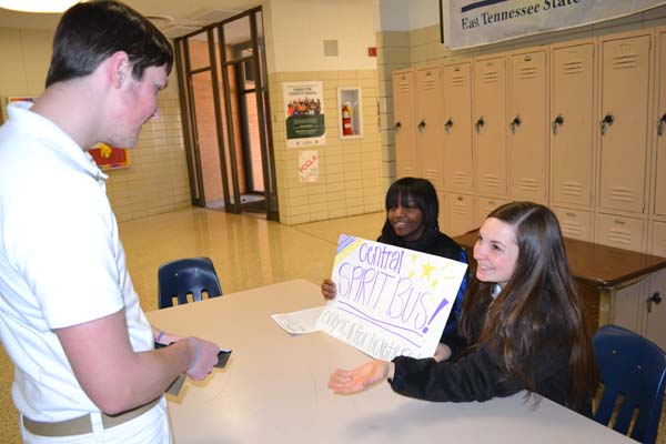 WEVE GOT SPIRIT! -- Central Cheerleaders Hannah Miller and Armiya Thomas selling a Spirit Bus ticket to a central student