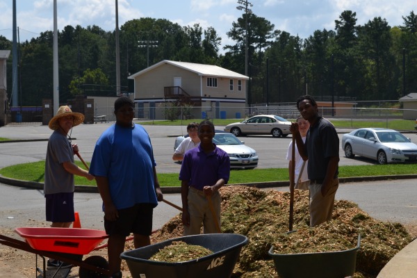 UPDATING THE AGORA -- Students helping renovate the Central High agora (among others) include Daniel Gann, Austin Ross, Antonio Foster, Brandon Galloway and Zarious Christian. Mr. Rick Rogers has been overseeing the project.