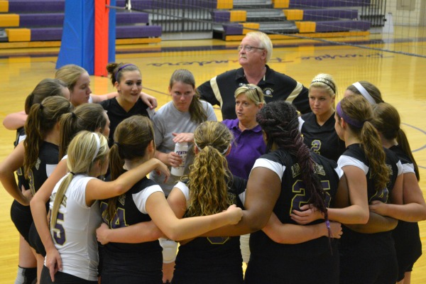 TOP COACH -- Coach Robin Moore huddles up with her Central girls.
