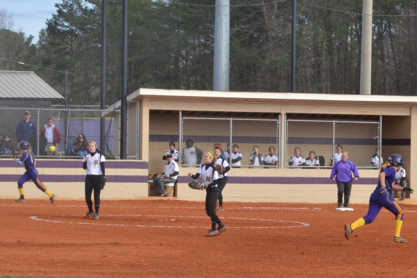 ROUNDING THIRD -- The softball season is just starting out and the Lady Pounders are extremely excited.
