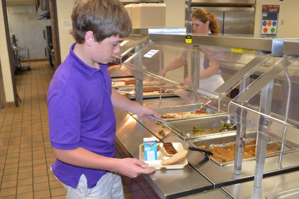 RISING LUNCH PRICES -- Students like Nathan Hood are facing new $3.00 lunch prices.
