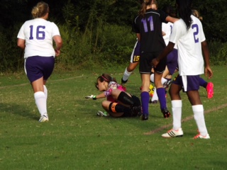 CENTRALS KEEPER DIVES FOR THE BALL--Madison Pitts, Rebecca Allen.