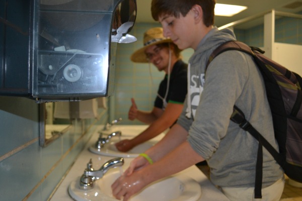 SCRUB A DUB -- Jake Whitaker and Matthew Cramer take the time to wash and dry their hands.