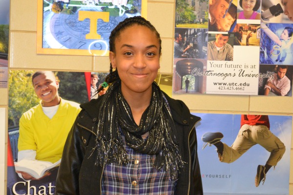 HAPPY AND HOPEFUL --Starlar Williams stands in the College Suite where her Chattanooga State acceptance letter is posted.