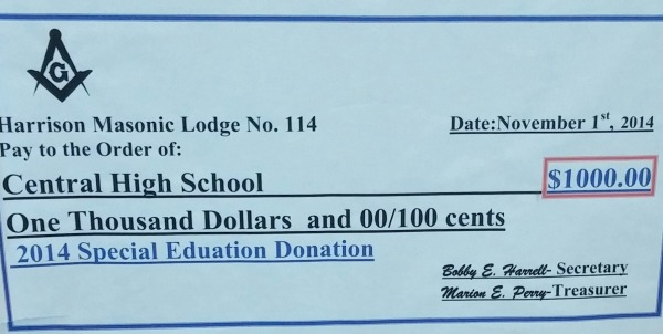 WHAT A DONATION -- The CDC program received a $1,000 gift from the Masons that is displayed at Centrals front office. 