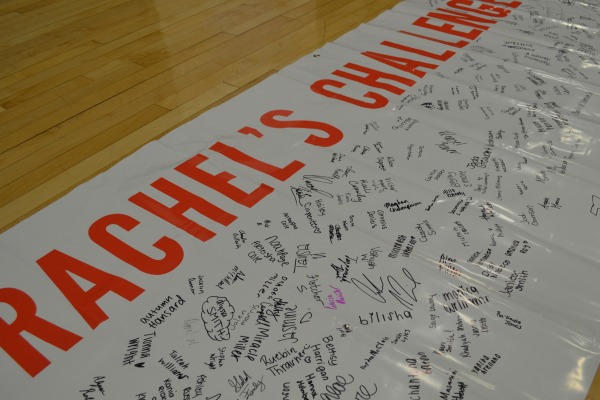 A COMMITMENT TO KEEP -- Upon leaving the assembly, students signed this banner, signifying that they accepted Rachels Challenge.