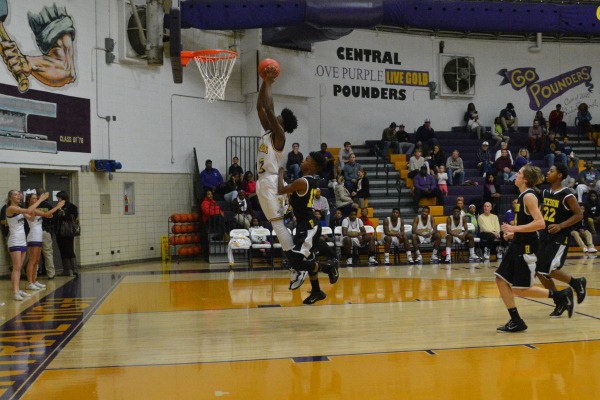 GO HARD OR GO HOME - Tre Tiller dunks beautifully on the Hixson Wildcats.