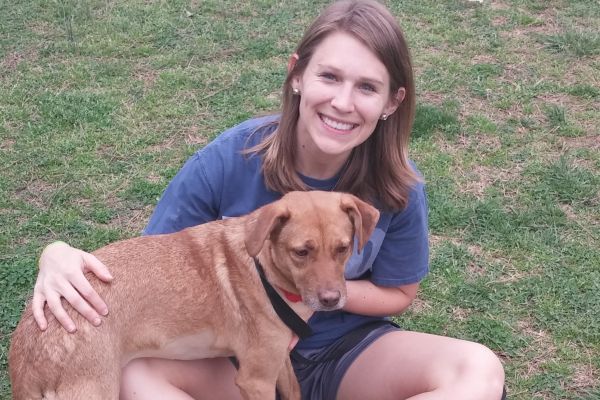 MARCHING THROUGH MARCH -- Ms. Katy Burnette and her new friend, Dude, like to play fetch and run in the rain.