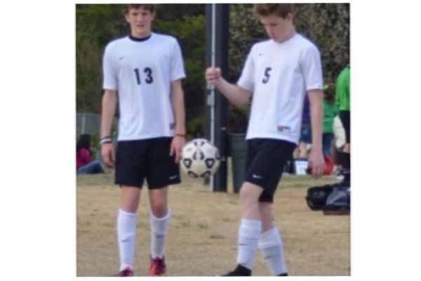 CENTRAL BOYS WARM UP BEFORE THE EAST RIDGE GAME -- Andrew Wagner (left) and Tyler Kuhn (right) warm up before the big game.