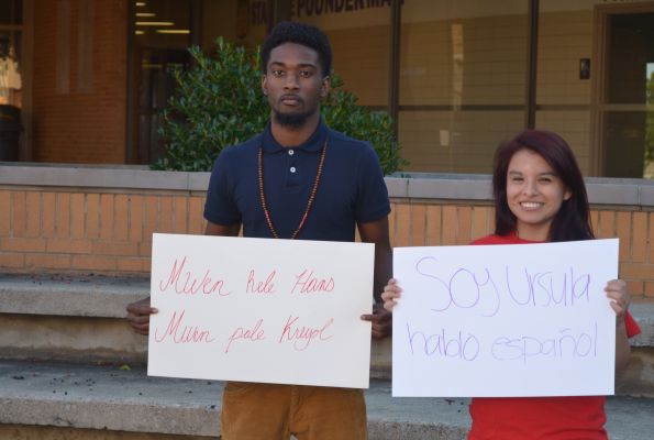 URSULA SANTOS AND HANS CASSIUS  DISPLAY THEIR OWN HOME LANGUAGE -- Seniors Ursula Santos and Hans Cassius show  the language they use at home is different than at school. 