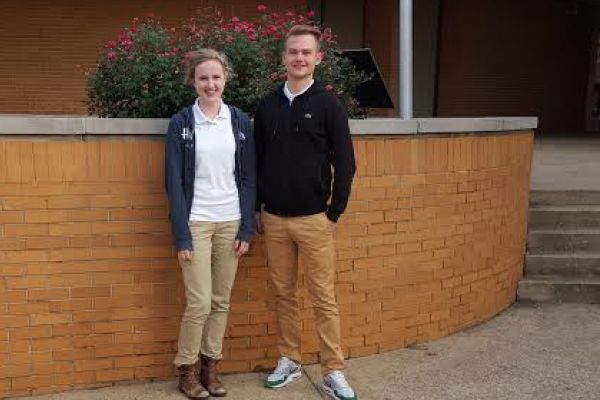 FOREIGN EXCHANGE STUDENTS ARE SETTLING INTO AMERICAN ROUTINE -- Johanna Degel and Finn Wesserling are finding American routine simpler and 