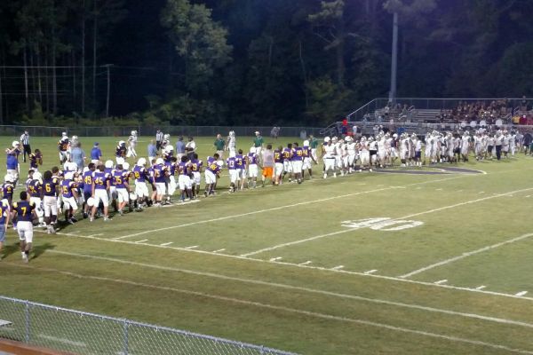 CENTRAL AND NOTRE DAME SHAKE HANDS AFTER A TOUGH GAME -- The teams shake hands after a long night on the field. 