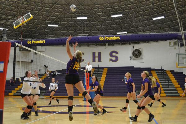 CENTRAL LADY POUNDERS FIGHT FOR VICTORY AT THURSDAY VOLLEYBALL GAME -- Centrals girls volleyball team battles for a win at volleyball game versus the East Hamilton Hurricanes. 