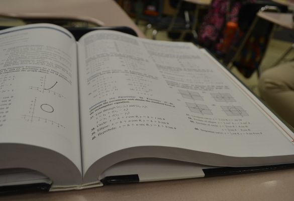 NEW MATH BOOKS MAKE STUDENTS THINK -- Central Highs new math curriculum promotes the use of brain power in school.