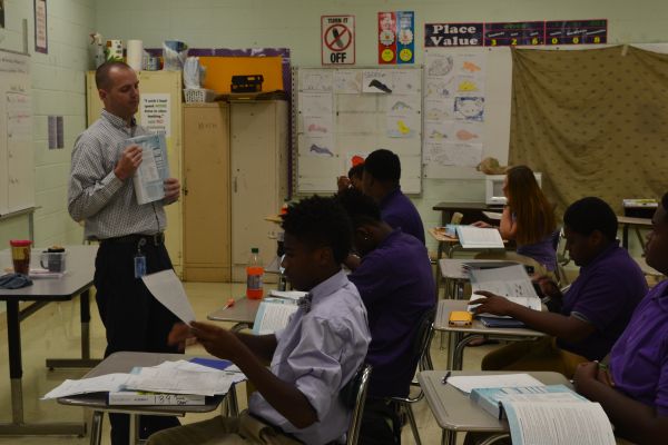 HARD AT WORK -- Mr. Mullins is committed to helping his students learn math.