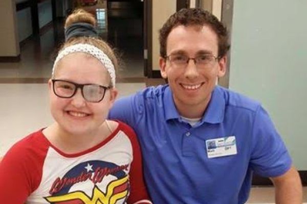 POST-SURGERY SMILES -- Summer Hansard (left) and her favorite physical therapist Matt Annessi (right) say, "Cheese!" for the camera after surgery. 