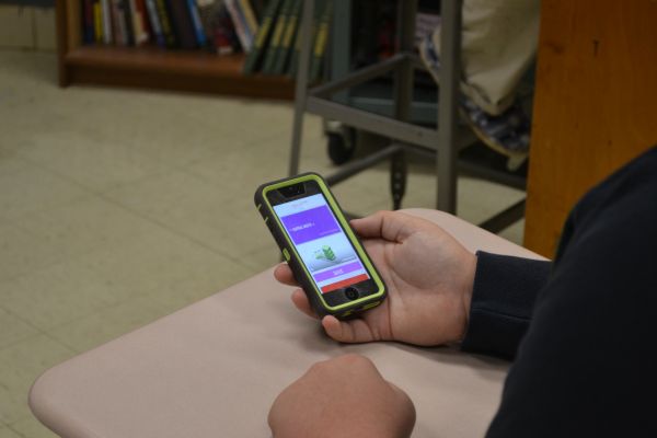 ANONYMITY HAS SPARKED THE INTEREST OF CHS STUDENTS -- Student, Austin Rosenzweig, browses through the new trending app. 