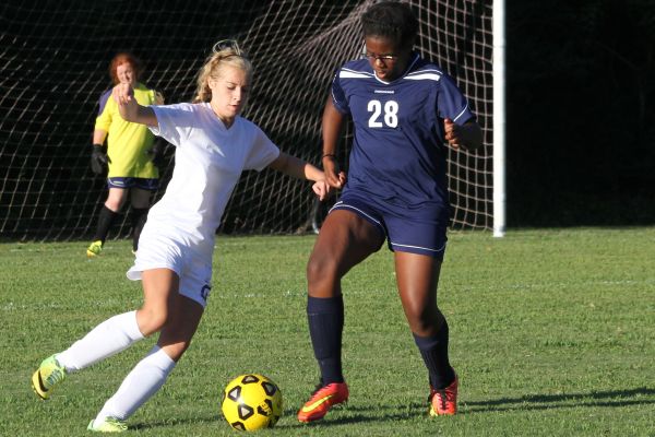 HUSTLING AND STEALING -- Centrals Celisia Snakenberg, forward, shows her aggression towards her opponent. 