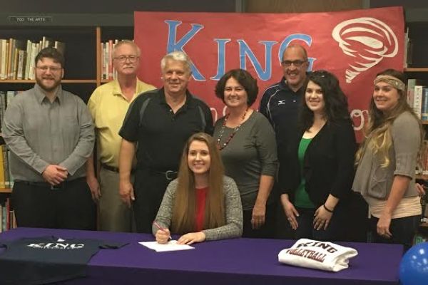 SIGNING PARTY -- CHS senior Rebecca Hill (seated) is so excited after getting signed to King University for volleyball. 