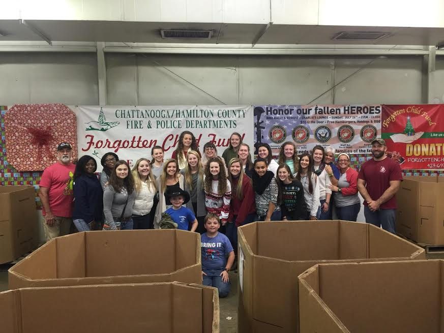 SPREADING CHRISTMAS CHEER- CENTRAL SOFTBALL TEAM GIVES BACK TO THE COMMUNITY 