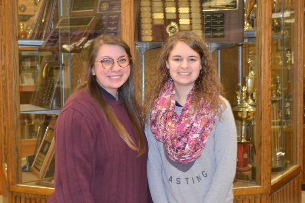 VALEDICTORIAN AND SALUTATORIAN -- Emma Beach (left), salutatorian, and Jadyn Snakenberg (right), valedictorian,  happily stand together as the top of their class.