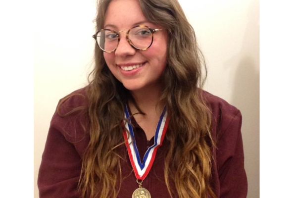 SENIOR EMMA BEACH RECEIVES GEORGE WASHINGTON MEDAL OF HONOR -- Salutatorian Emma Beach receives a medal of honor due to her hard work and outstanding writing abillities.