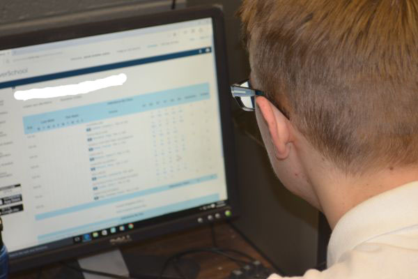 STUDENT CHECKS GRADES ON POWERSCHOOL -- Josh Sizemore logs into PowerSchool to review his fourth quarter grades.