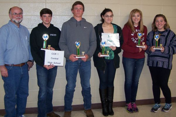 CENTRALS ENVIROTHON TEAM GETS AWARDED THIRD PLACE -- (Left to right) Coach Dillard Evans, Doug Bell, Tucker Smith, Shasta Faile, Shelby Campbell, and Hannah Stone smile for the camera with their third place trophies. 