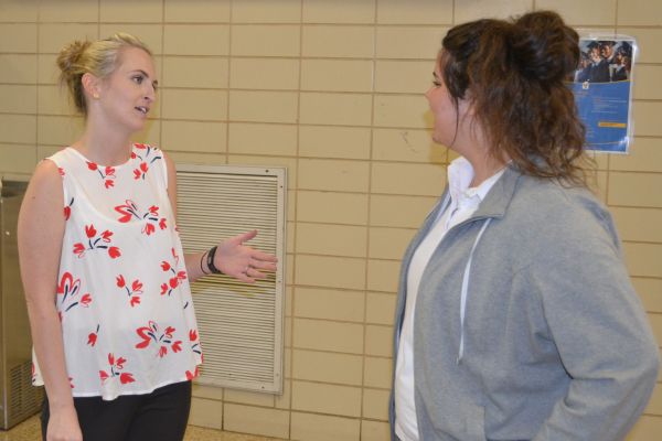 NEW SCHEDULING -- Mrs. Lindsey Ruggles (left) explains the scheduling procedures for next year to upcoming senior Rachel Woodward. 