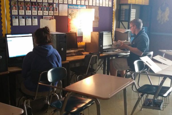 YEARBOOK STAFF PUTTING IN WORK-- Dalton Calimer and Yoselin Tesorero working on the 2016-17 yearbook