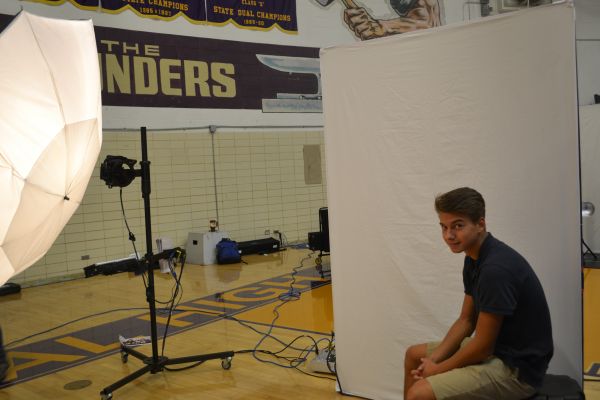 SMILE FOR THE PICTURE -- Students get all nice and pretty for their perfect shot in the yearbook.