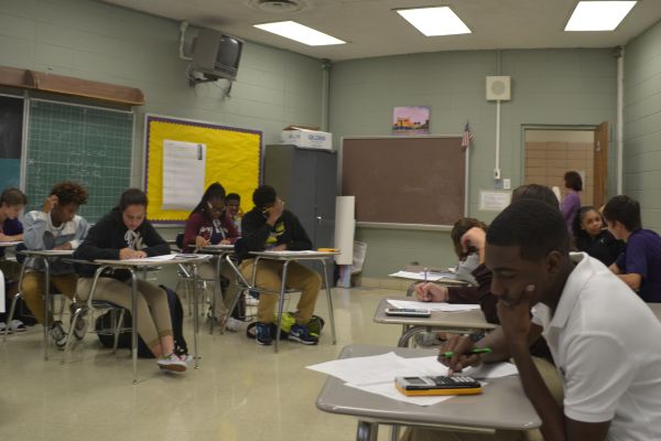 SOME STUDENTS SUFFER FROM A MATH PHOBIA -- Algebra I students in Ms. Brazeale's class strive to soar in math. 