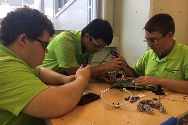 THIRTY-SIX STUDENTS APPLIED FOR UPCOMING YEAR AT THE VOLKSWAGEN MECHATRONICS AKADEMIE -- Last fall's Mechatronics Akademie students learning in the Volkswagen Academy building's classroom.