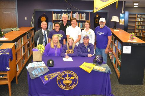 HEADED TO TECH -- Brooke Parrot signs to play for Tennessee Tech while her friends, family, teachers, and coaches stand by her.