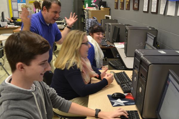 STAFF MEMBERS HARD AT WORK -- (Left to right) Central Digest Assistant Editor Preston Fore, Editor-in-Chief Savannah Smith, Copy Editor Shelby Cambell, and adviser Gregory Cantrell discuss a new story suggestion. 