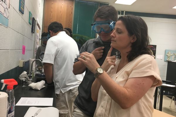 GRANT MONEY OFFERS NEW LAB EXPERIENCE FOR STUDENTS -- Tina Cotreau experiments in the lab with forensic science student Walker Waters. 