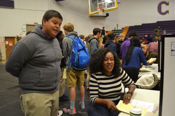 FRESHMEN STUDENTS GET A REALITY CHECK -- Central High freshmen check-in with various life scenarios to get a reality check.