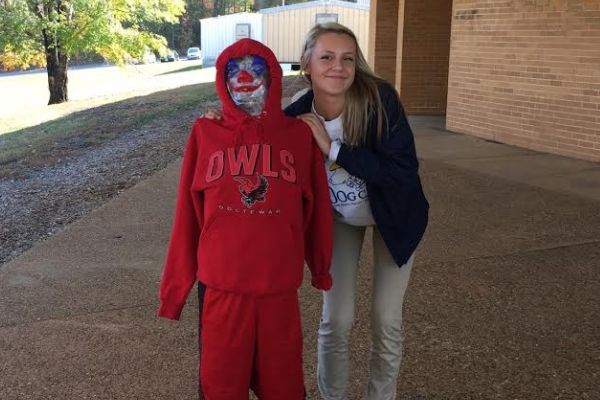 JUNIORS CREATE THEIR OWN FRANKENSTEIN --Student, Kaitlyn McAfee creates her Ooltewah Owl Monster for her project.