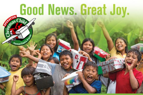 OPERATION CHRISTMAS CHILD --  Children celebrate happily as they receive their gifts from the organization 