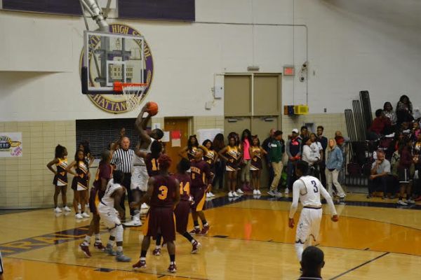 POUNDERS SHOOT FOR 2 -- The Central Boys Basketball Team goes up for 2 points against the Tyner Rams on November 22nd.