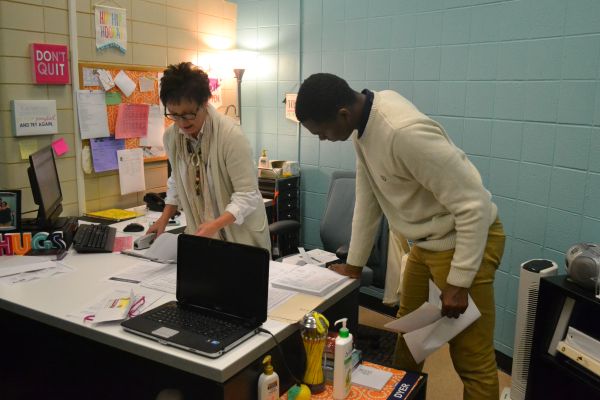 CENTRAL HIGH SENIORS EAGER TO RECEIVE ONE OF SEVERAL ALUMNI ASSOCIATION SCHOLARSHIPS  -- Centrals college access adviser, Susan Dyer, and senior DAndre Anderson discuss potential scholarship opportunities. 