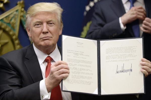 TRUMP SIGNS ONE OF 13 EXECUTIVE ORDERS -- In the wake of Trumps first ten days, protests have broken out all over the nation. 