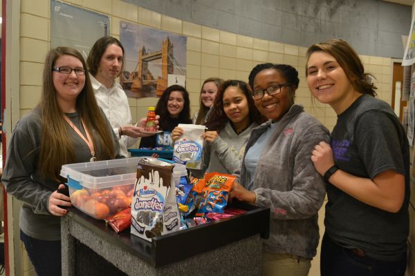 THE RURITEEN CLUB PASS OUT TREATS TO CENTRAL TEACHERS -- The ruriteen club members treat Mr. Parsons, an English 10 teacher, to show their appreciation.