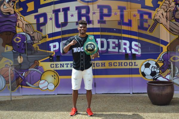 RYAN MARTIN REMINISCES ON PAST CENTRAL EXPERIENCES -- Ryan Martin stands in front of Central High Schools gymnasium.