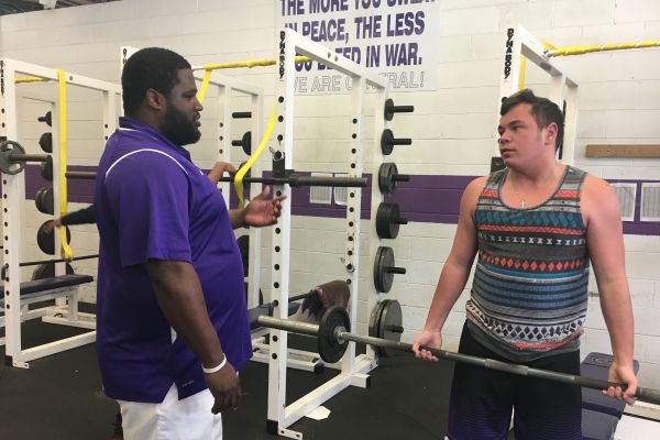 BRASWELL TO COACH TN-GA ALL-STAR FOOTBALL GAME-- Braswell(left) working with student athlete Jake Biddy (right) in the weight room.