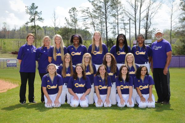 CENTRALS SOFTBALL TEAM -- - The girls are in it to win it as they take a group shot before practice.