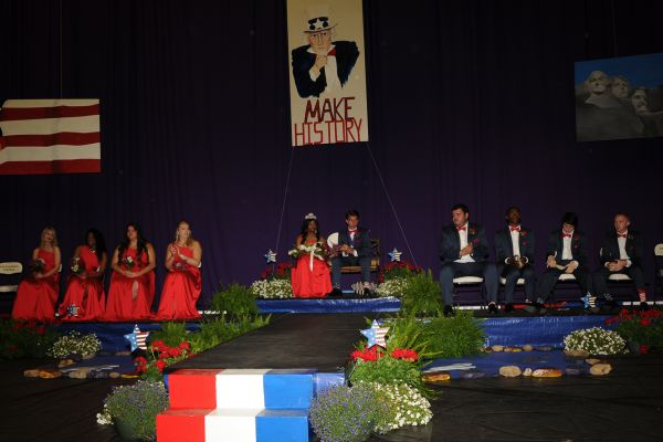 JARED EDDY AND DIAMOND JACKSON CROWNED MR. AND MS. CENTRAL --  Jared Eddy and Diamond Jackson (center) sit among the other candidates on Senior Day.