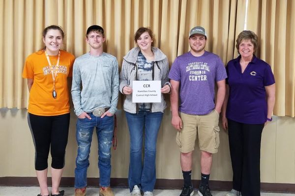 DONNA SELLERS SHARED 4TH PLACE WIN AT ENVIROTHON WITH STUDENTS -- Donna Sellers(far right), coach of Central's Envirothon team, celebrates a 4th place win with students (from left to right) Hannah Holmberg, Blake Williams, Shelby Campbell, and Elijah Garner.